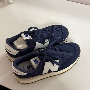 New Balance Dark Blue and White Sneakers